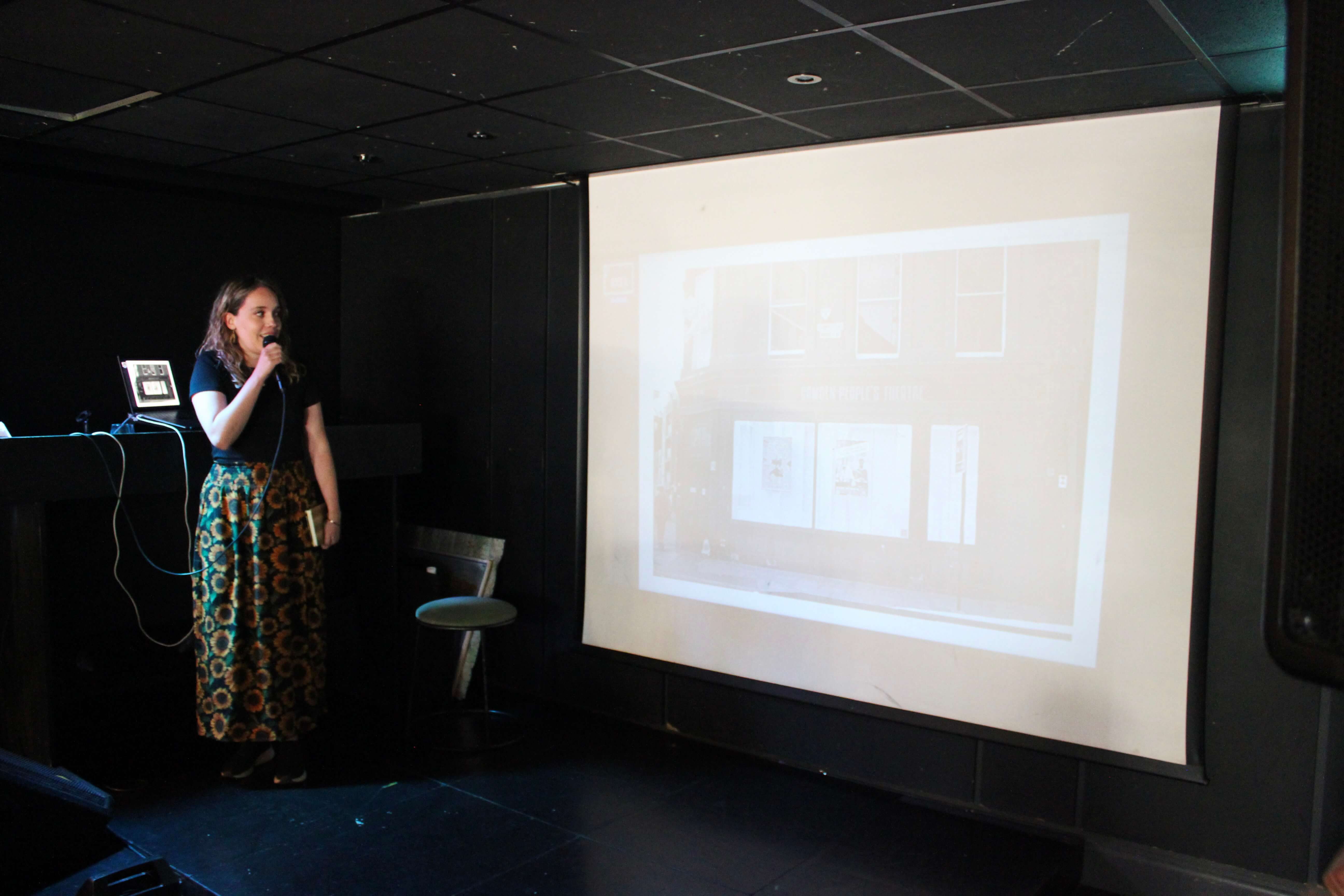 Natalia Knowlton Vásquez talking on stage.