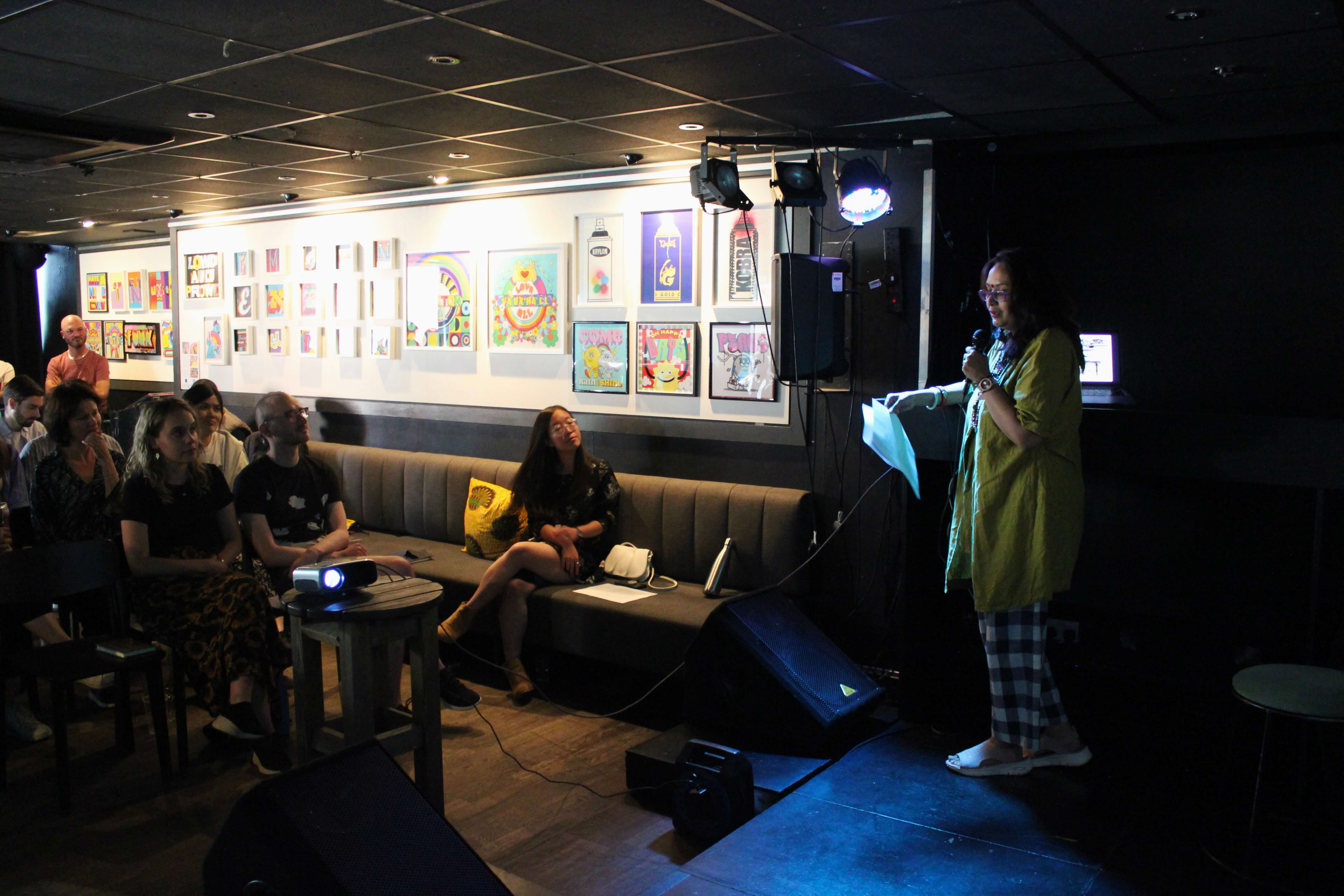 Rifat Mahbub talking on stage.